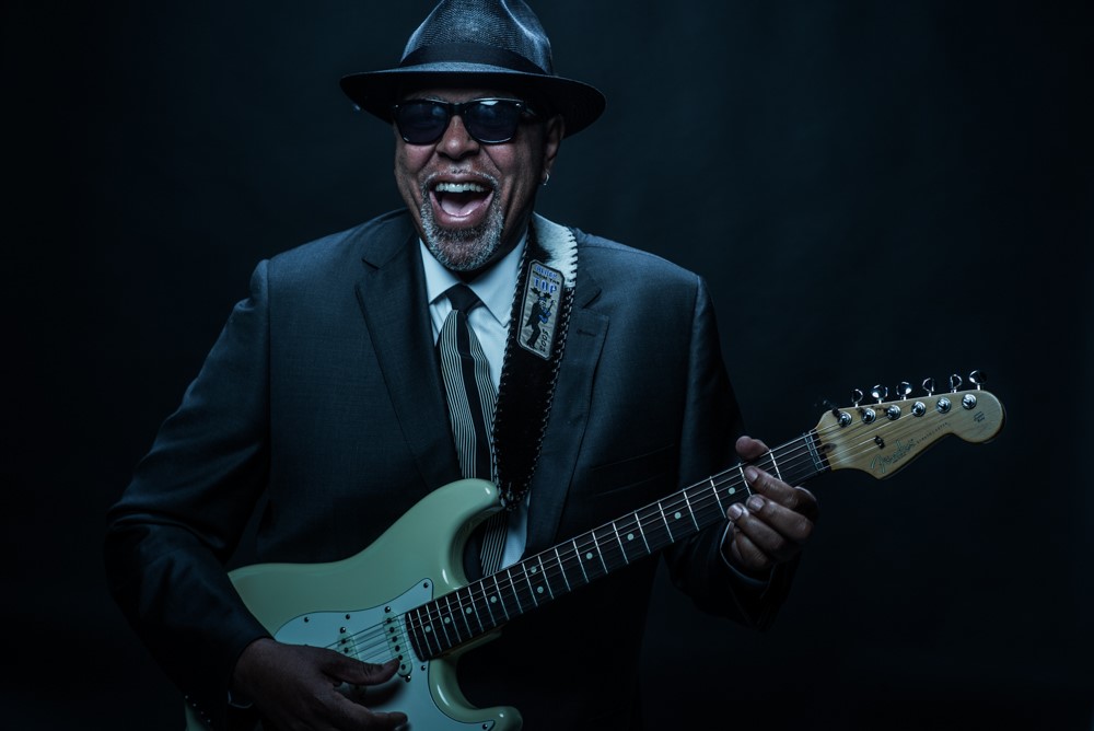 Zac Harmon at first Flint River Blues Fest — portrait with guitar